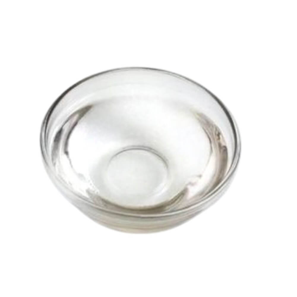 Clear cosmetic-grade Propylene Glycol in a glass bowl - used as a humectant and solvent in skincare and haircare formulations.