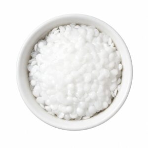 A dish of silky emulsifying wax ready to be added into a formulation.